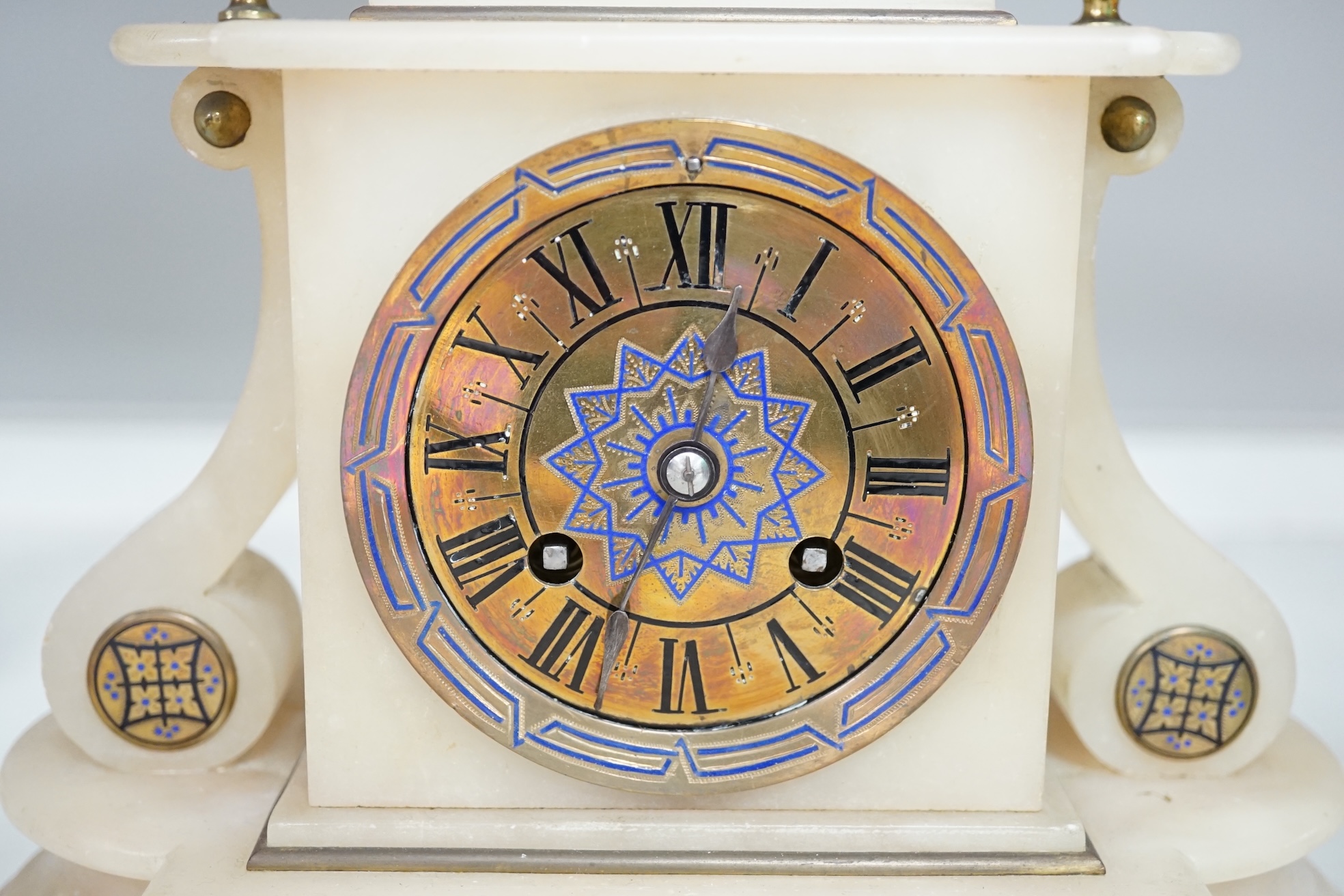 A Victorian alabaster mantel clock, striking on a bell, height 27cm. Condition - fair.